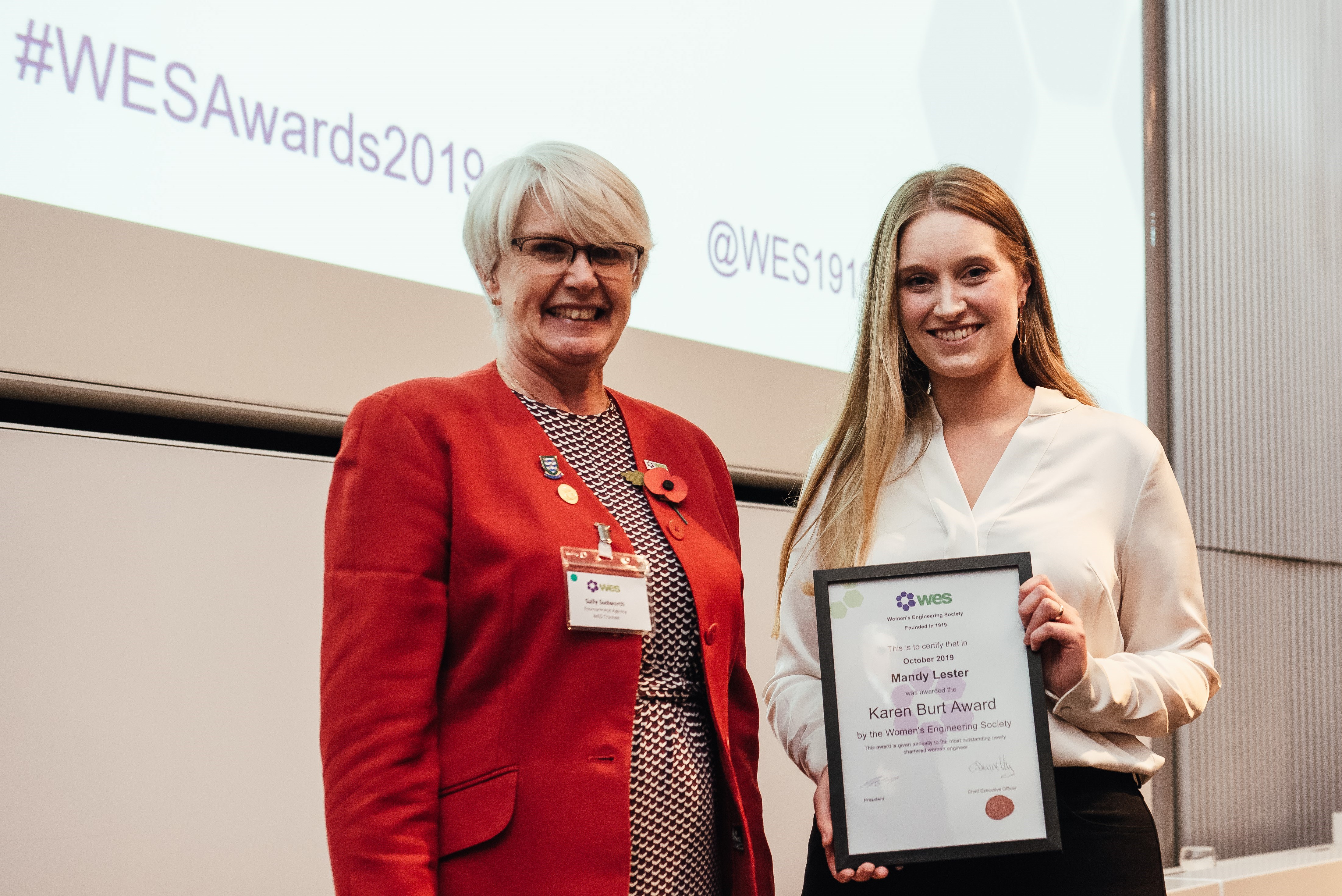 Mandy Lester receiving the WES Karen Burt Award for best new female Chartered Engineer from Sally Sudworth