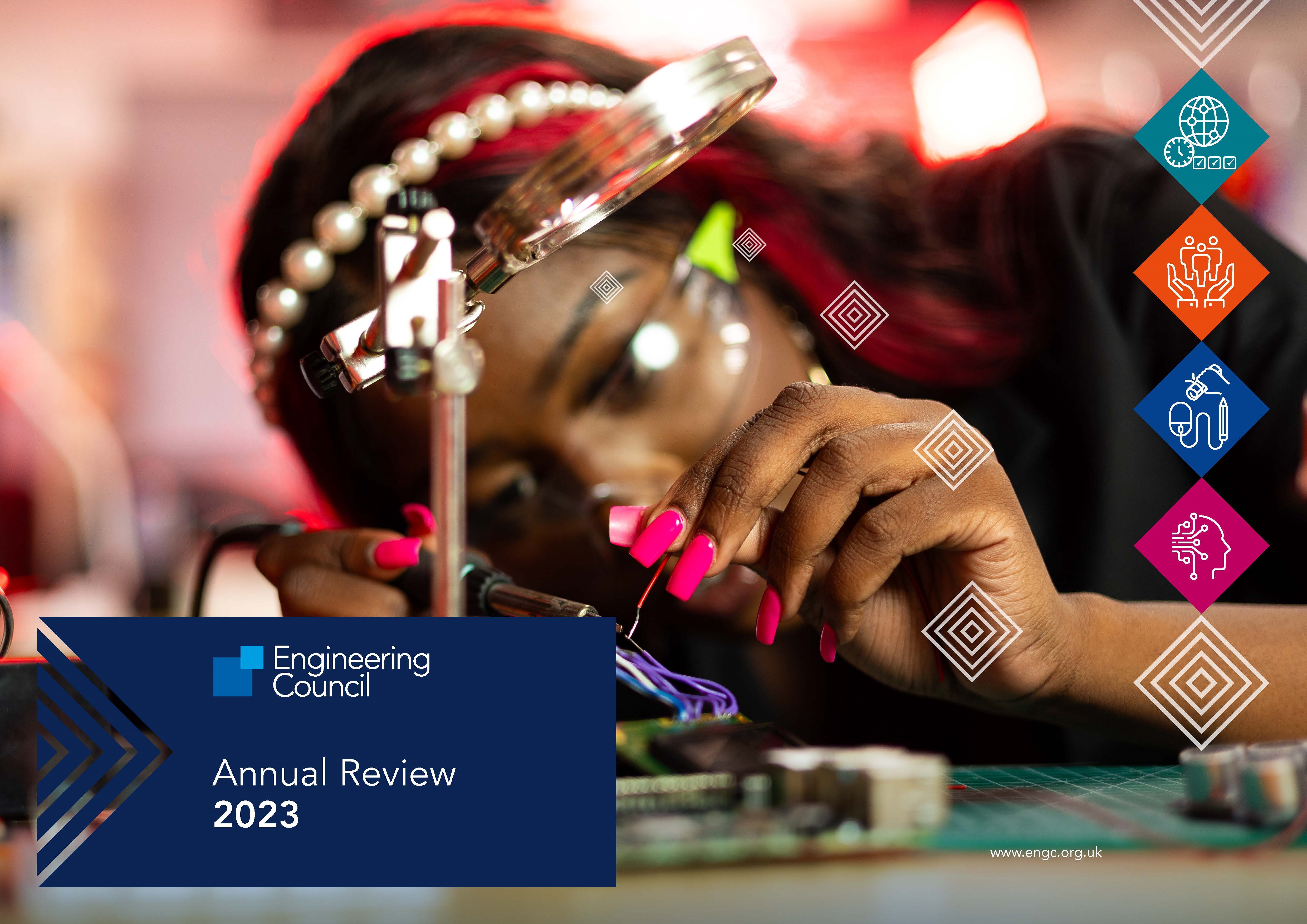 front cover of the Annual Review 2023 a female engineer with long pink fingernails, solders wires