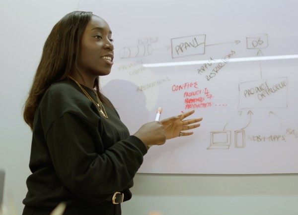 Female software engineer presents © This is Engineering large