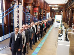 ICE staff line up along LEGO bridge