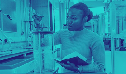 Blue tinted image - black woman engineer works in lab, recording measurements