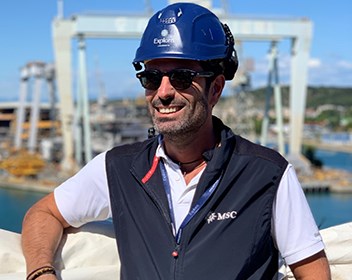 Man in sunglasses and hard hat