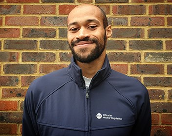 Smiling man in blue jacket